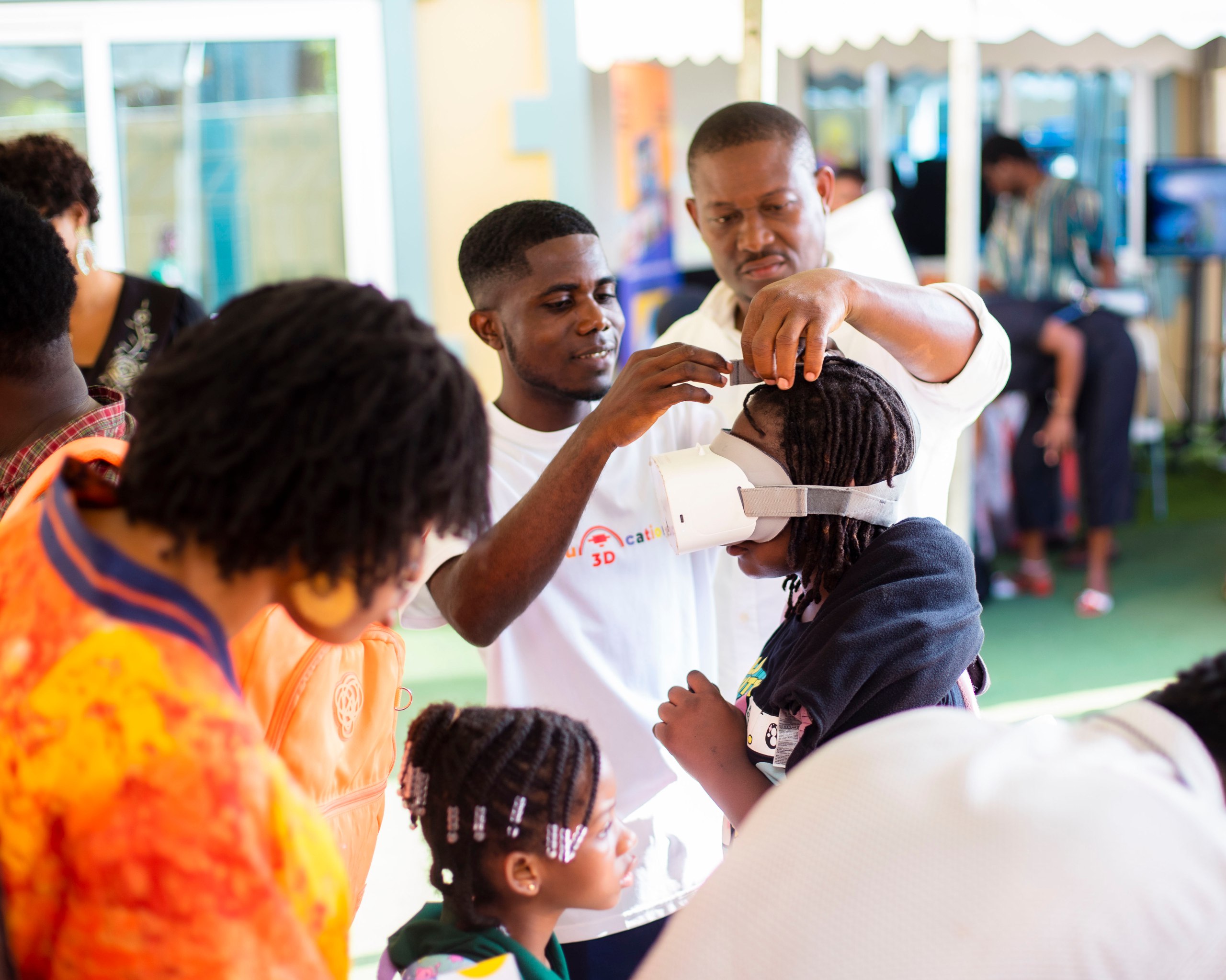 An instructor assists a student with a virtual reality headset while others observe, fostering a Culture of Collaboration through shared discovery and open communication in an outdoor learning setting.
